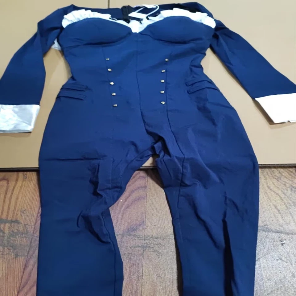 Mono azul con capa gris pechuga negra Foto 1 de 1