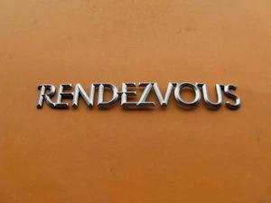 02 03 04 05 06 BUICK RENDEZVOUS REAR SILVER EMBLEM LOGO BADGE SIGN SYMBOL A38502 - Picture 1 of 4