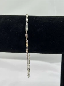 Viintage Avon Silver colored Twist Bracelet - Picture 1 of 5