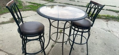 table and 2 chairs its a pretty worn but itt still good and the glass is still - Image 1 of 4