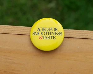 Aged For Smoothness & Taste 1 1/4" Metal Advertising Pin Pinback Button - Picture 1 of 2