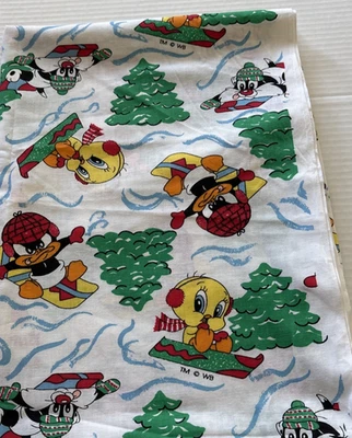 Tela navideña vintage Looney Tunes bebé bebé 1 3/4 yardas/44 pulgadas de ancho Foto 1 de 2