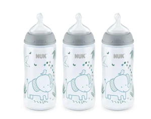 NUEVO NUK Biberón Anticólicos Flujo Suave 10 OZ - Paquete de 4 Elefante Transparente - Imagen 1 de 6