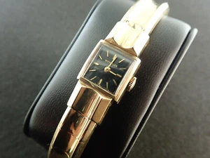 NICE 12.5MM LADIES BLACK DIAL WITTNAUER GOLD FILLED CUFF WRIST WATCH - RUNNING - Picture 1 of 6