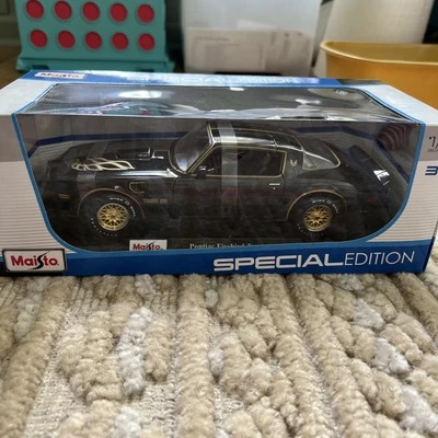 Maisto Special Edition 1/18 Diecast Bandit Pontiac Firebird Trans Am Black - Image 1 of 4