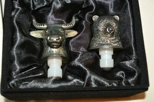 wall st FLAWLESS Stunning NEIMAN MARCUS Stock Market BULL & BEAR BOTTLE STOPPERS - Picture 1 of 3