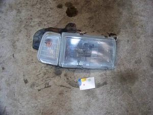 1998 Chevrolet Chevy Tracker Passenger Right Headlight Turn Signal W/ Bracket - Picture 1 of 6