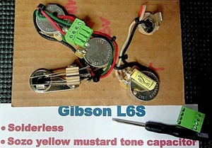 Imbracatura cablaggio senza saldatura Gibson L6S + tappo vintage senape gialla Sozo tono spec - Foto 1 di 6