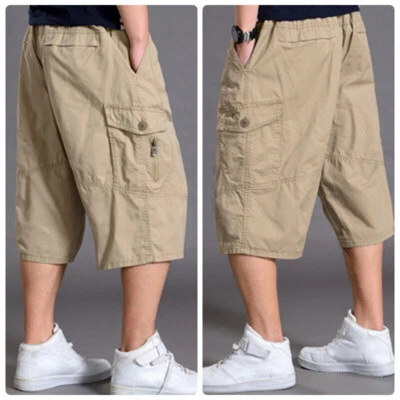 Pantalones cortos cargo holgados de algodón informales lisos talla grande para hombre de 3/4 de longitud Foto 1 de 4