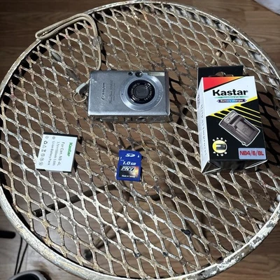 Cámara digital Canon PowerShot SD600 6,0 MP, 3x zoom con batería, cargador, 1 GB SD Foto 1 de 4