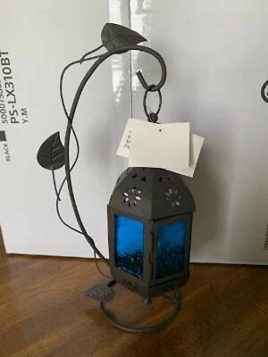 Candelabro con flor de zafiro Foto 1 de 2