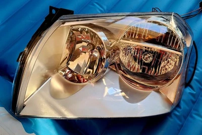 Левая фара в сборе Eagle Eyes CS176-B001L для Dodge Magnum 2005-2007 годов выпуска - Изображение 1 из 4