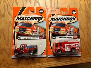 2 Matchbox 50 Logo Red Fire Trucks 2001 Dennis Sabre All Terrain Tanker 1/64 New - Picture 1 of 6