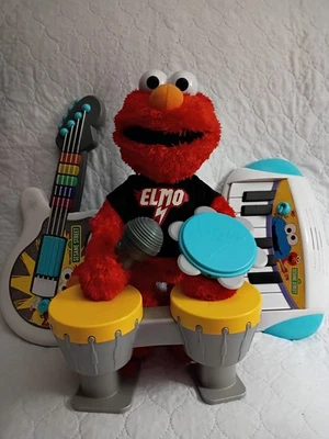 Sesame Street Let's Rock! Elmo Con Accesorios Teclado/Guitarra/Batería/Micrófono/Tam. Foto 1 de 4