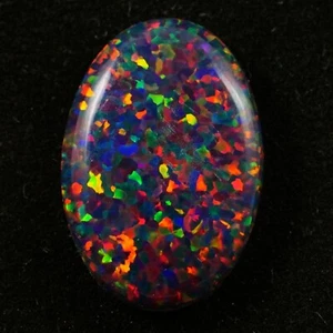 Cabujón ovalado de ópalo de fuego negro 10x8 mm 1,3 quilates AAA+ piedras preciosas sueltas australianas - Imagen 1 de 4