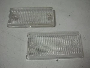 COPPIA PLASTICHE RETROMARCIA LANCIA BETA BERLINA 2°SERIE - NUOVE - ORIGINALI - Foto 1 di 1