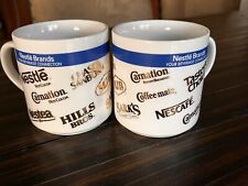 Lot of 2 Vintage “Nestle Brands” Coffee Mugs Nescafé Carnation Hills Bros Nestea