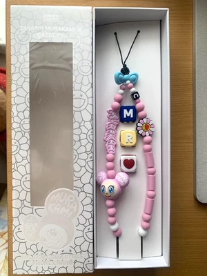 Correa para teléfono inteligente CASETiFY Takashi Murakami Collaboration MR. DOB rosa limitada Foto 1 de 4