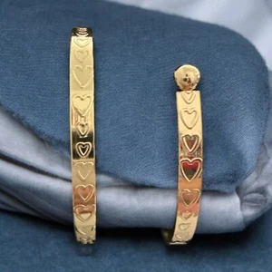 Gold Plated Bangle Bracelet With Heart Stamped Throughout The Bangle - Picture 1 of 3
