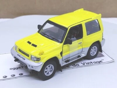 HONGWELL scala 1:43 Mitsubishi Pajero giallo, due aperture, die-cast, senza box - Immagine 1 di 4