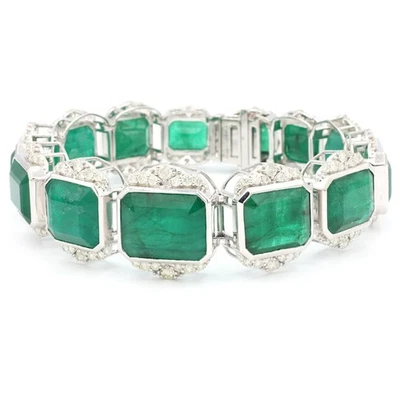 Brazalete tenis de oro blanco de 18 quilates con esmeralda y diamantes de 85,17 quilates y 3,81 quilates Foto 1 de 4