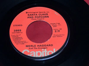 45 RPM Merle Haggard Santa Claus And Popcorn, Through Dec Capitol Vinyl 3989 EX - Picture 1 of 4