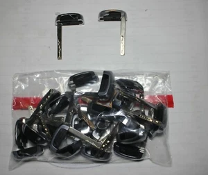 LOT OF 25 NEW MINT USED / CUT GENUINE OEM FORD SMART KEY EMERGENCY KEY BLANKS - Picture 1 of 1
