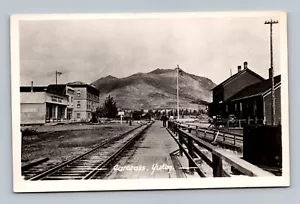 CARCROSS TERRITORY YUKON RR TRACKS AND CITY REAL PHOTO POSTCARD (J-2) - Picture 1 of 2