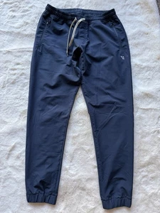 Vuori Transit Jogginghose Herren Medium Navy Blau Tech Stretch Weave - Bild 1 von 8