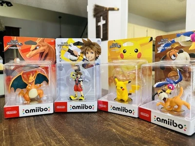 Lote de 4 Precintados Nintendo Super Smash Bros Amiibos: Sora, Charizard, Pikachu Etc. Foto 1 de 4