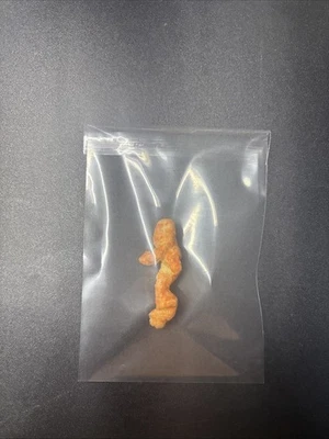 Cheeto en forma de persona corriendo Foto 1 de 2