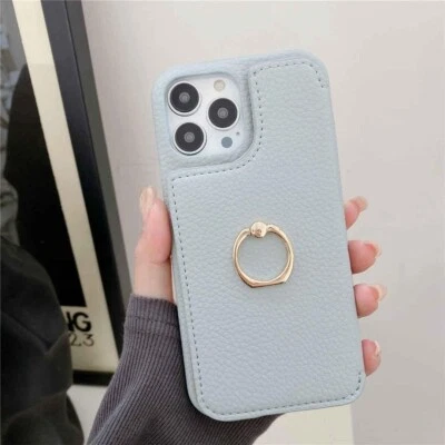 Funda billetera de cuero granulado para iPhone 15 con espejo cosmético incorporado y anillo para el dedo Foto 1 de 3