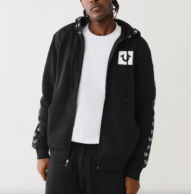 TRUE RELIGION - SUDADERA CON CAPUCHA CON CREMALLERA CON LOGOTIPO - Negro / Blanco - L - Usada 1 vez Foto 1 de 4