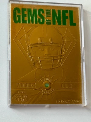 1997 Pro Line Gems Gems of the NFL 23K Gold Warrick Dunn #G15 Rookie RC - Image 1 of 4