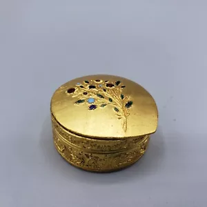 Portapillole vintage metallo dorato con smalto fiore e foglia su coperchio bigiotteria rotonda - Foto 1 di 10