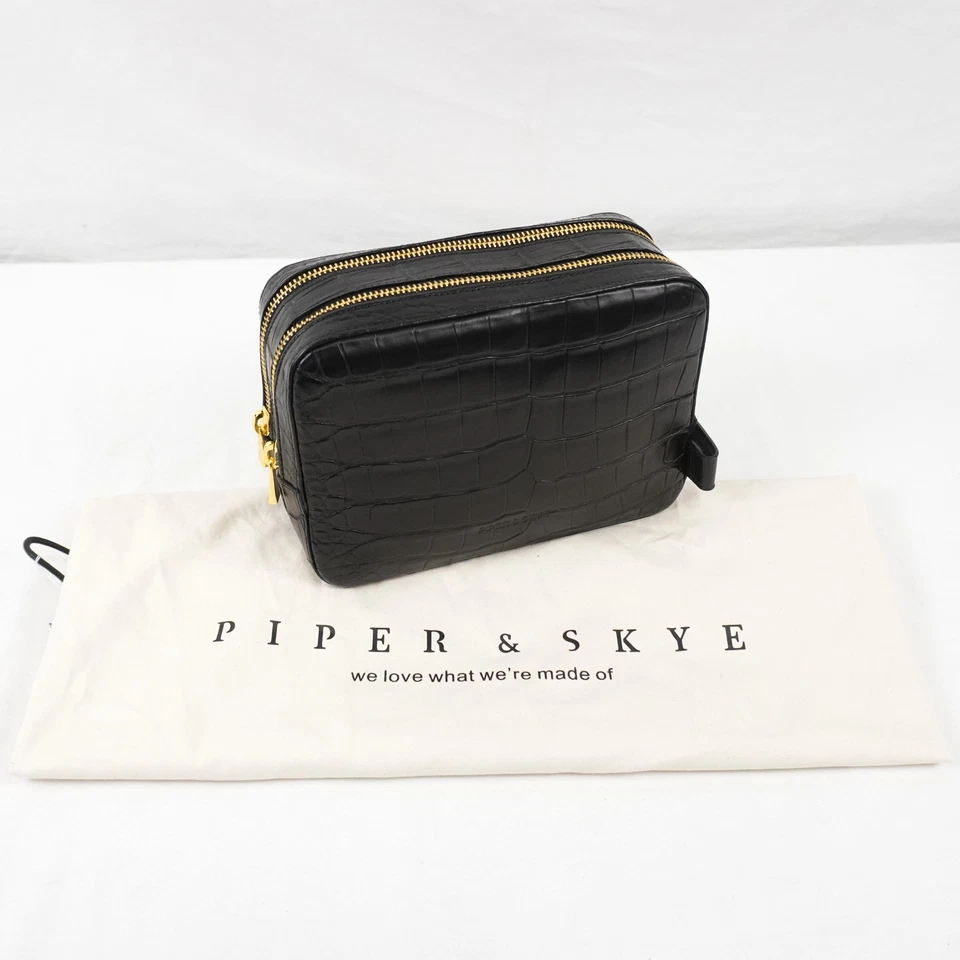 Kit/bolsa de aseo Piper & Skye Nomad Dopp en tono dorado cocodrilo negro medianoche Foto 1 de 4