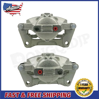 Nuevo par de 2 soportes de pinza de freno de disco delantero para Dodge Grand Caravan Nitro 08-10 Foto 1 de 4