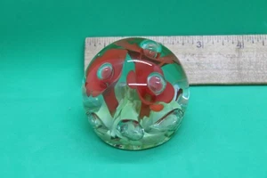 2 1/2" Glass Paperweight with red flowers & bubbles - unsigned - Picture 1 of 4