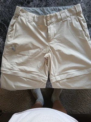 Calça World Wide Sportsman feminina tamanho 8 e curta dupla com zíper curta cáqui bronzeada - Imagem 1 de 4