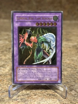 Yu-Gi-Oh! Elemental Hero Flame Wingman TLM-EN035 UTR 1st Edition Silver Stamp LP - Image 1 of 4