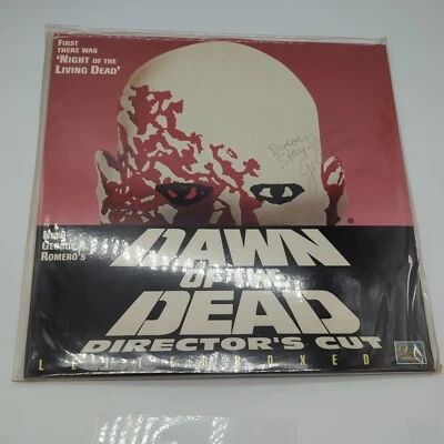 Dawn Of The Dead ~ George A Romero's Directors Cut Laserdisc Signed + Flyer - Image 1 of 2