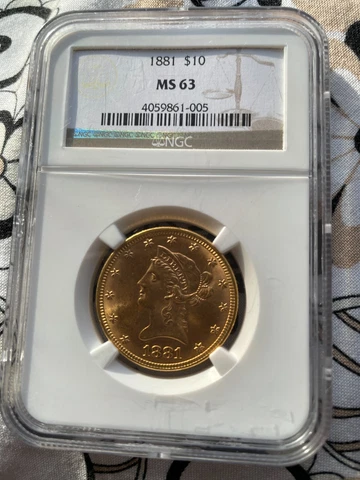 1881 $10 Gold Liberty Eagle, NGC MS-63 grade, stunning appearance.  $200 drop! Cover