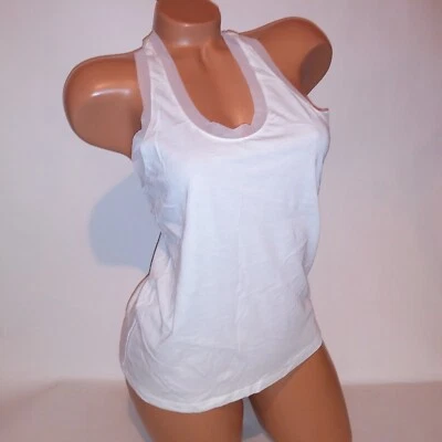 Camiseta sin mangas Victoria Secret XS deportiva blanca ribete de malla lisa sin mangas espalda deportiva Foto 1 de 4