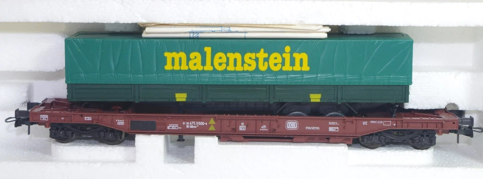 ROCO Réf: 46366 Wagon poche chargé d'une remorque MALENSTEIN en BO (999) - Photo 1/1