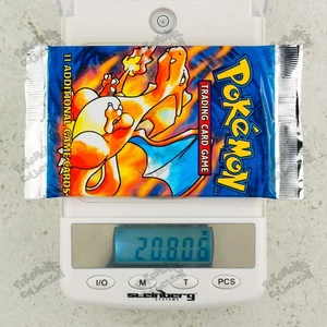 20.806g Charizard art! Pokemon Base Set Booster Pack TCG 4th print UK 1999-2000 - Picture 1 of 15