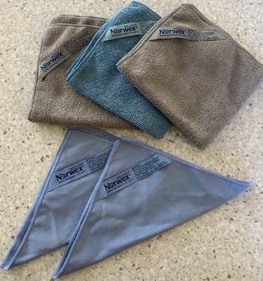 Paño desmaquillante facial NORWEX azul (2) y microfibra corporal (3) todo con reloj Foto 1 de 4