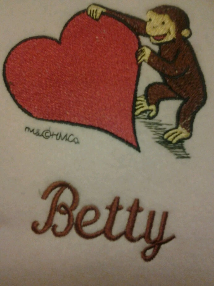 Manta bebé bordada personalizada con curioso George y corazón Foto 1 de 1