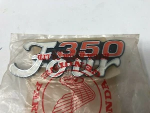 NOS HONDA LEFT SIDE COVER EMBLEM BADGE CB350 CB 350 F FOUR 87129-333-000 - Picture 1 of 4