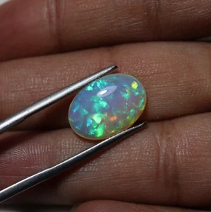 5.4 Cts 16.5x11.8 MM Natural AAA Multi Fire Flashy Ethiopian Opal Oval Cabochon - Picture 1 of 9