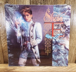 Sheila E. - In Romance 1600 - Vinyl LP - 1985  25317-1 - Vintage VG/VG IN SHRINK - Imagen 1 de 2